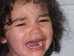 baby crying because of teeth 